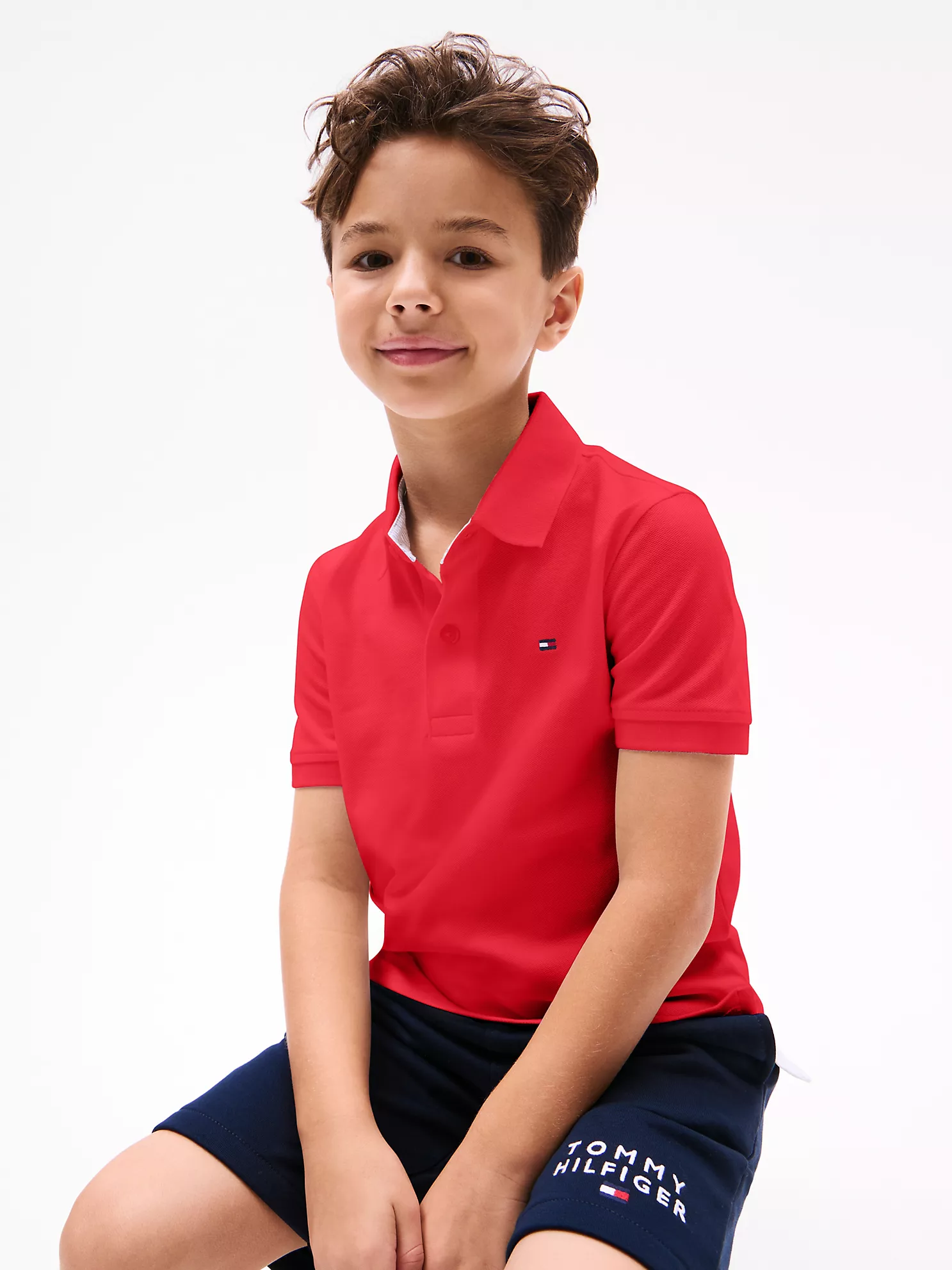 Kids' Solid Stretch Polo - Primary Red 7 Kids' Solid Stretch Polo
- Primary Red