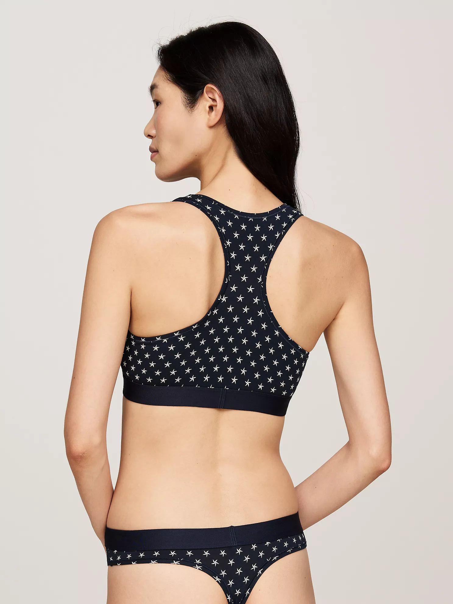 Tommy Logo Star Print Unlined Bralette - All Stars 9 Tommy Logo Star Print Unlined Bralette
- All Stars