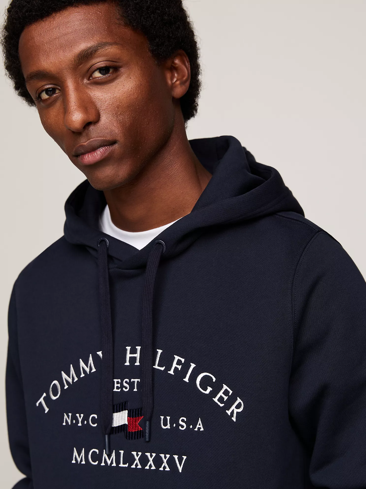 Embroidered Tommy Arch Logo Hoodie - Navy 7 Embroidered Tommy Arch Logo Hoodie
- Navy