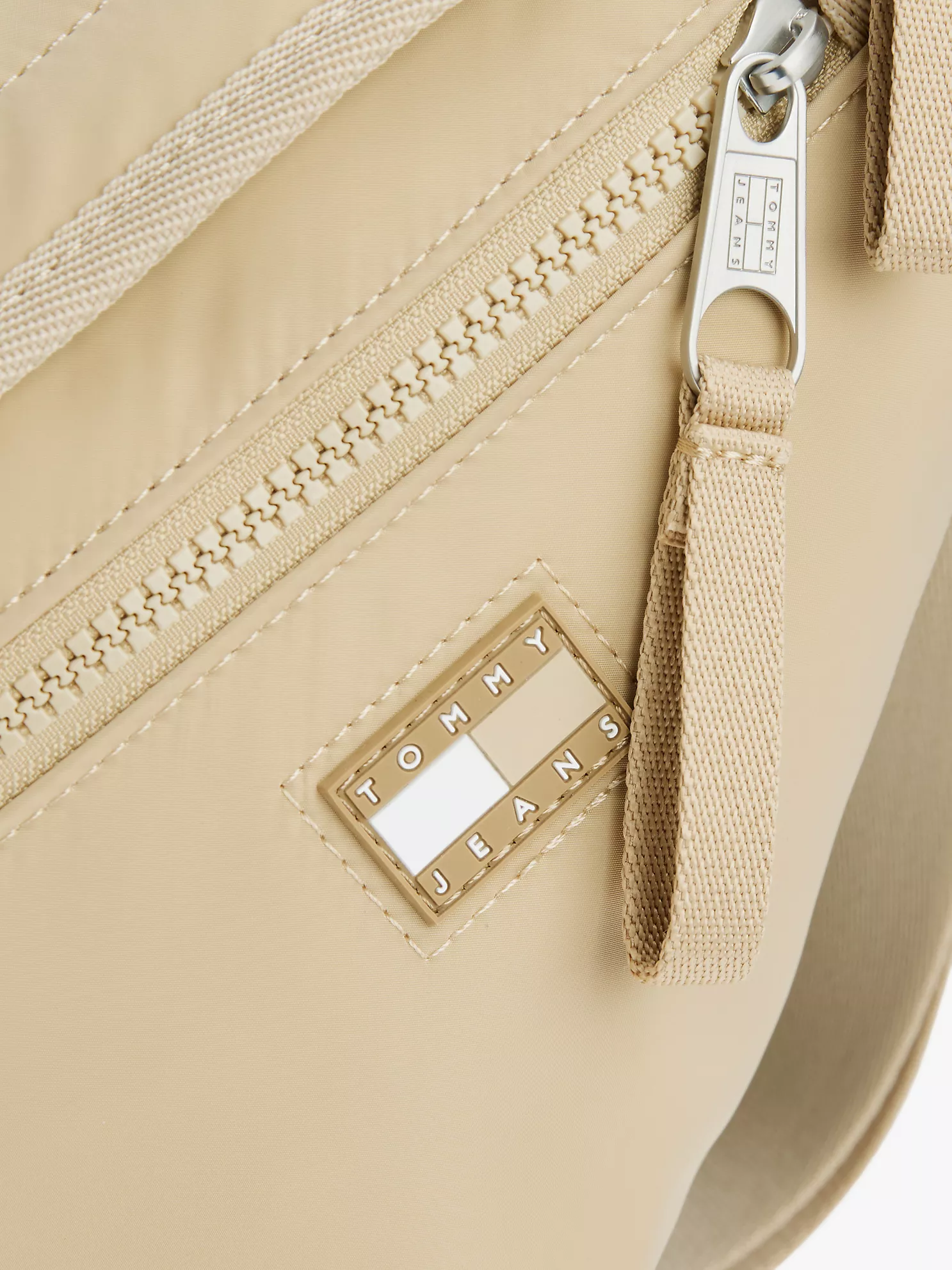 Tommy Jeans Sling Bag - Gentle Gold 8 Tommy Jeans Sling Bag
- Gentle Gold